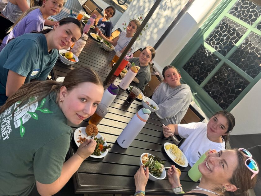 Girls enjoying meals together at ADTC, an overnight dance camp for girls